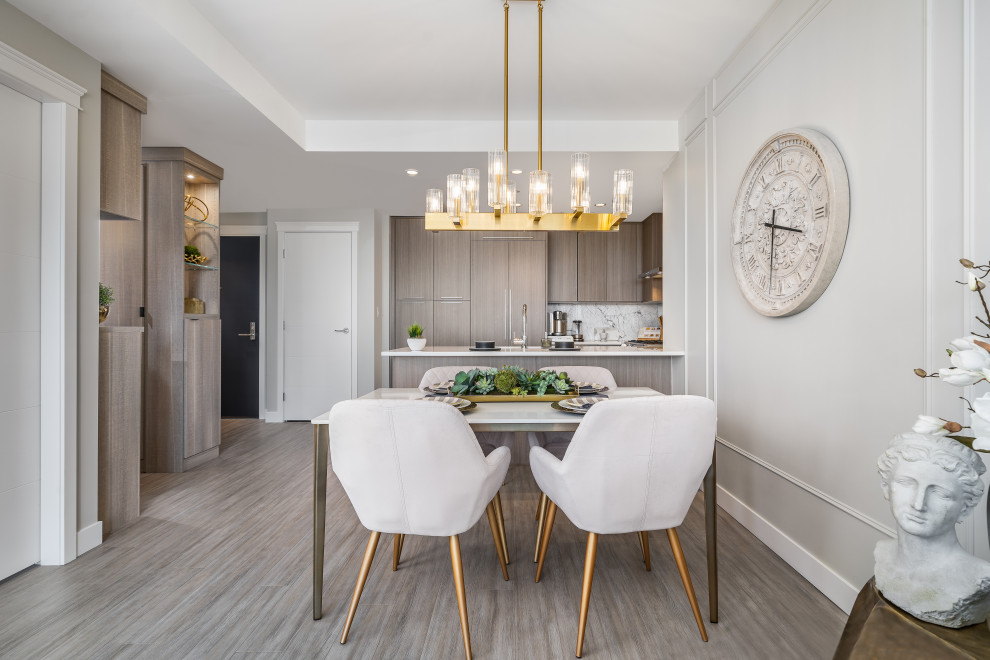 Kitchen/dining room combo - small transitional laminate floor and gray floor kitchen/dining room combo idea in Vancouver with gray walls and no fireplace