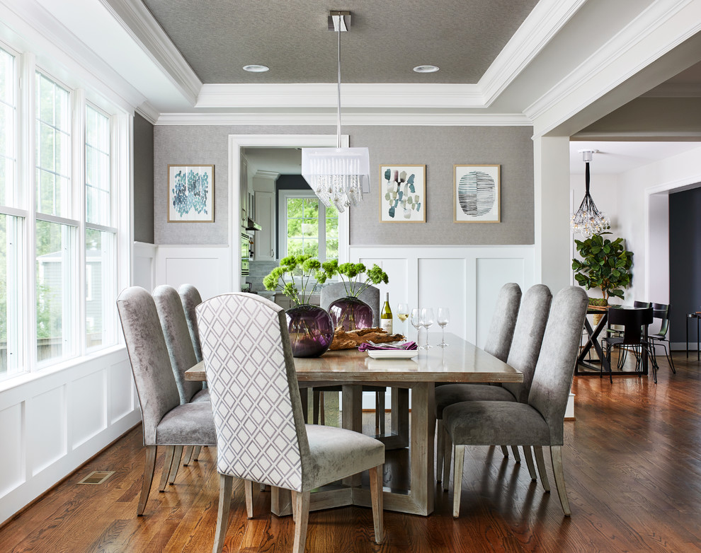 Enclosed dining room - mid-sized transitional brown floor and dark wood floor enclosed dining room idea in DC Metro with gray walls and no fireplace