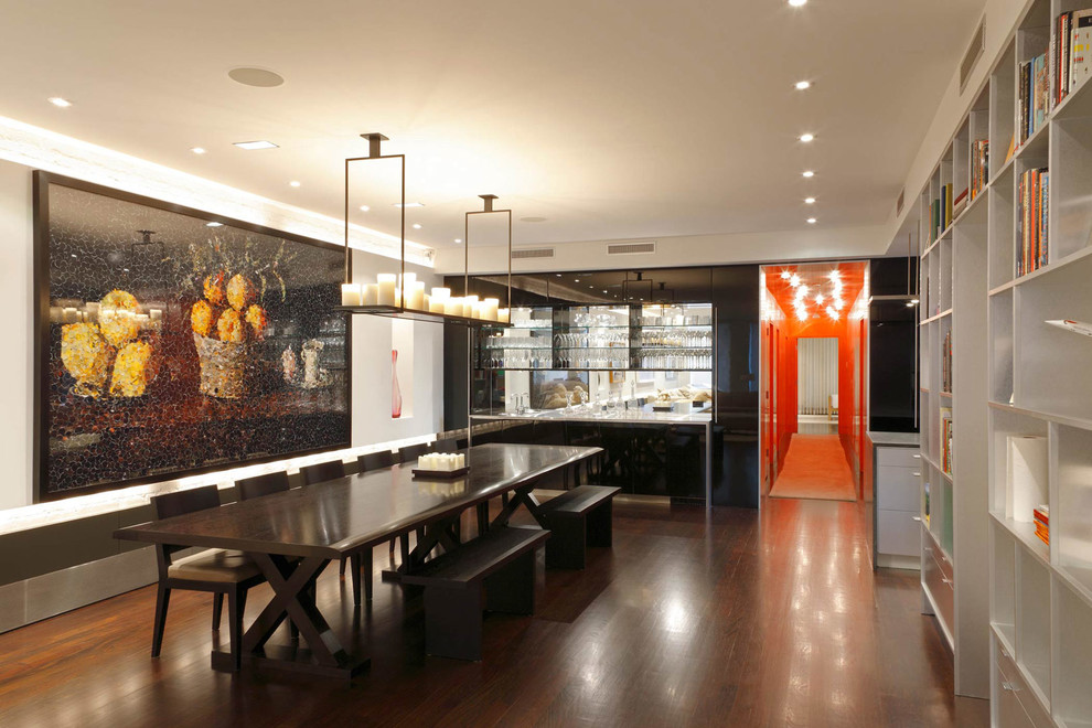Inspiration for a contemporary dark wood floor enclosed dining room remodel in New York with white walls and no fireplace
