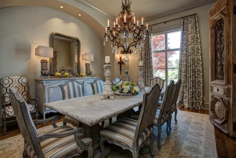 Enclosed dining room - large traditional medium tone wood floor enclosed dining room idea in Little Rock with beige walls