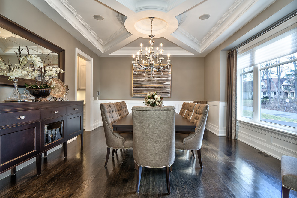 Large trendy dark wood floor enclosed dining room photo in Toronto with gray walls
