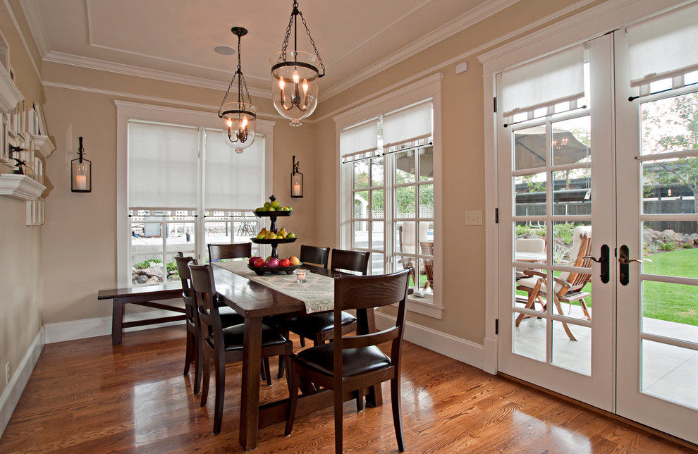 Inspiration for a traditional dining room in Seattle with beige walls.
