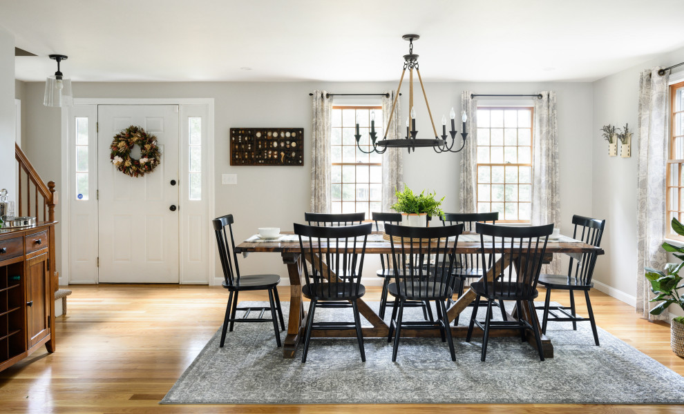 Inspiration for a large classic kitchen/dining room in Boston with grey walls, medium hardwood flooring and brown floors.