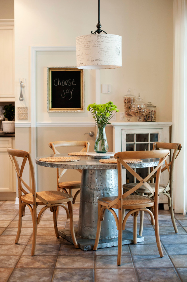 Inspiration for a transitional dining room remodel in Tampa with white walls