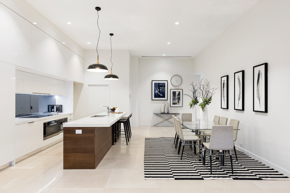 Ispirazione per una sala da pranzo aperta verso il soggiorno moderna di medie dimensioni con pareti bianche, pavimento con piastrelle in ceramica e pavimento beige