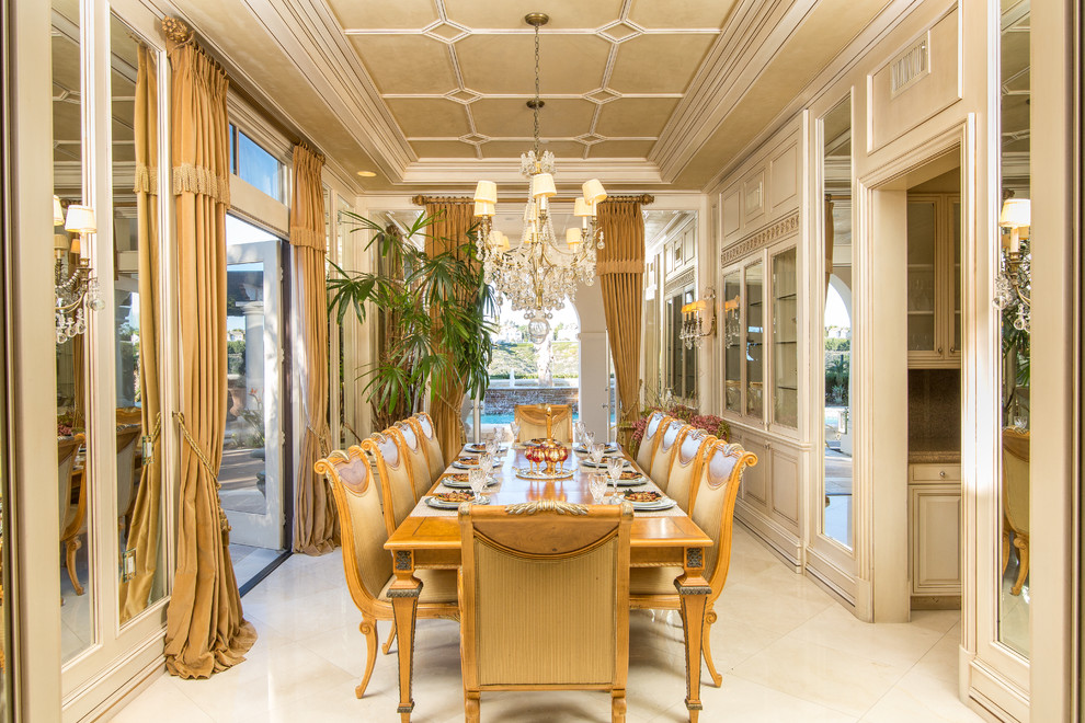 Traditional enclosed dining room in Orange County with beige walls and no fireplace.