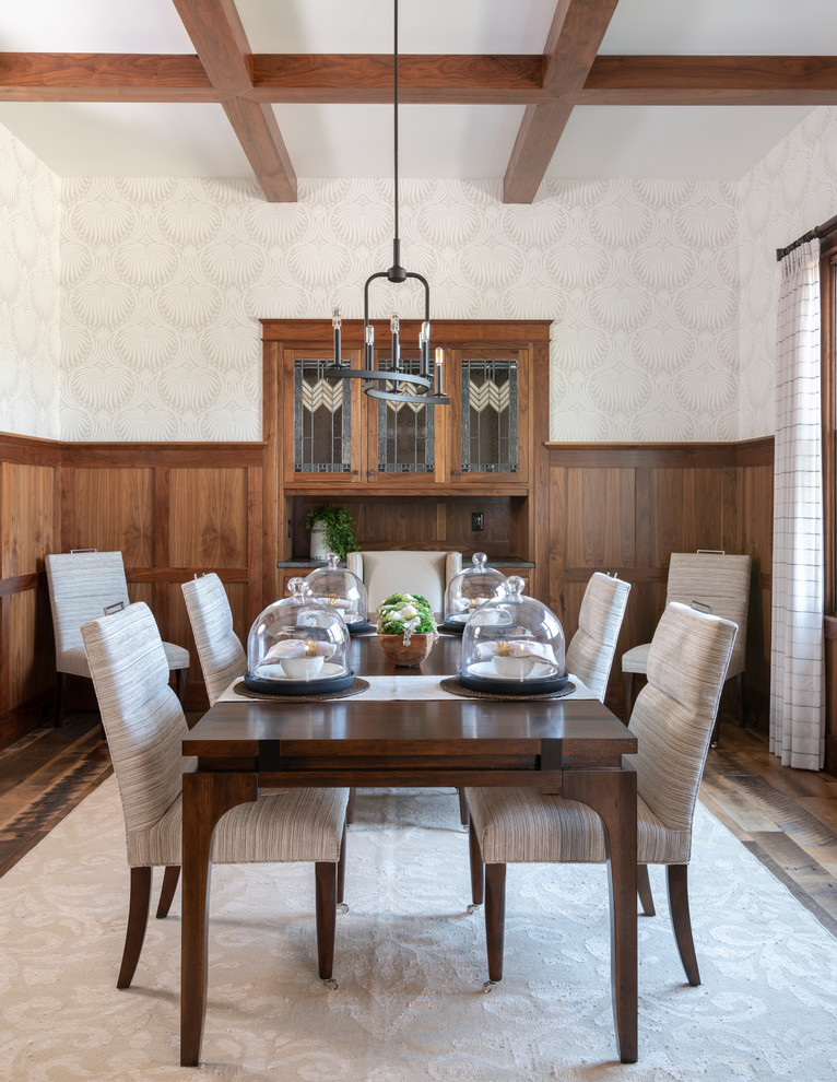 Photo of a classic enclosed dining room in Dallas with white walls, medium hardwood flooring and brown floors.