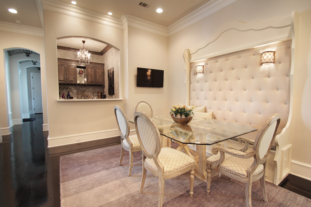 Inspiration for a large timeless dark wood floor dining room remodel in Dallas with beige walls