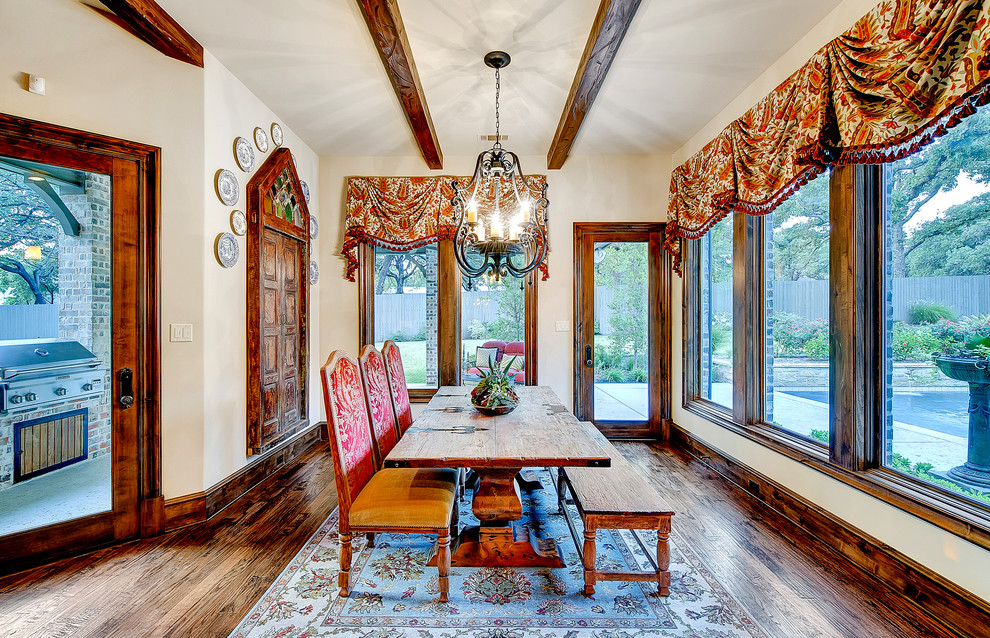 Enclosed dining room - large traditional dark wood floor enclosed dining room idea in Dallas with beige walls and no fireplace