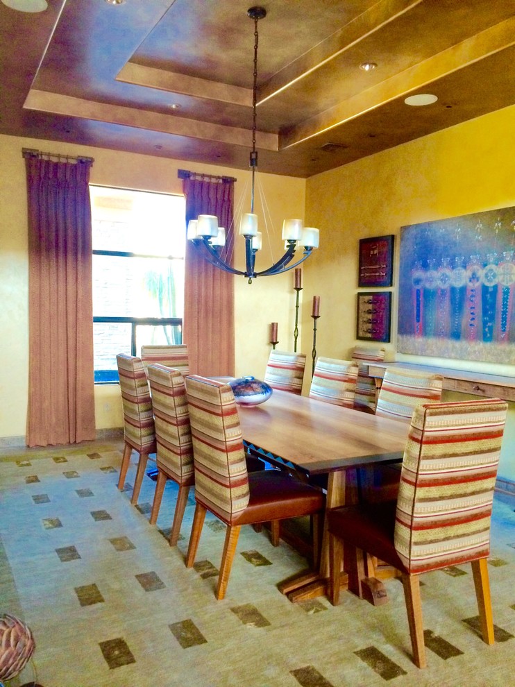 This is an example of an expansive traditional dining room in Phoenix.