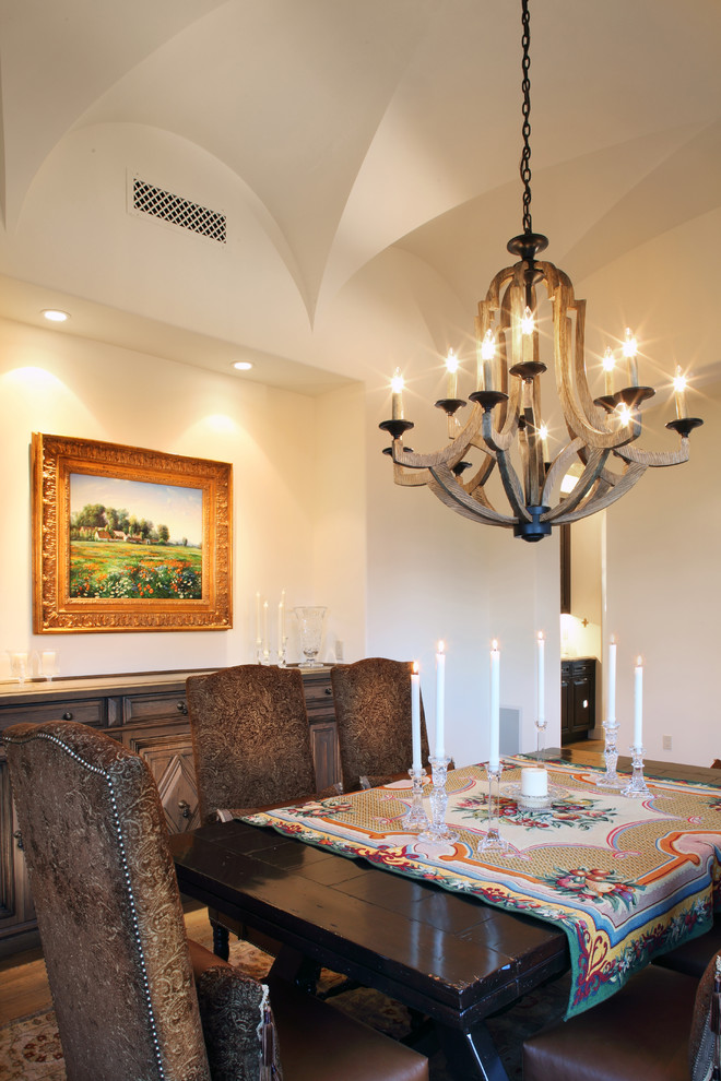 Design ideas for a medium sized enclosed dining room in Phoenix with beige walls and medium hardwood flooring.