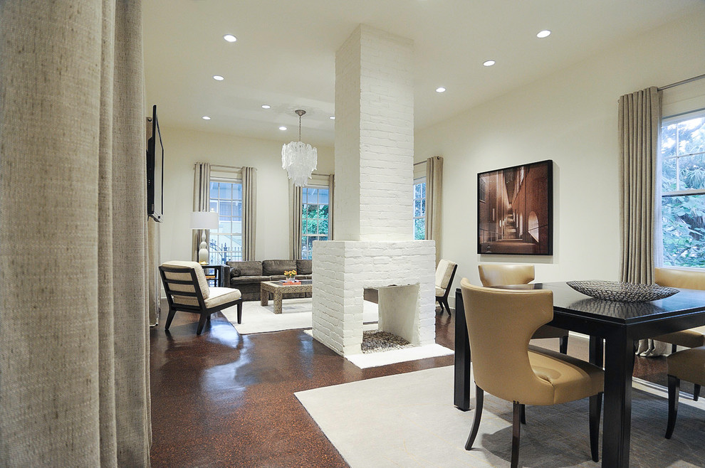 Great room - mid-sized transitional cork floor and brown floor great room idea in New Orleans with white walls, a two-sided fireplace and a brick fireplace