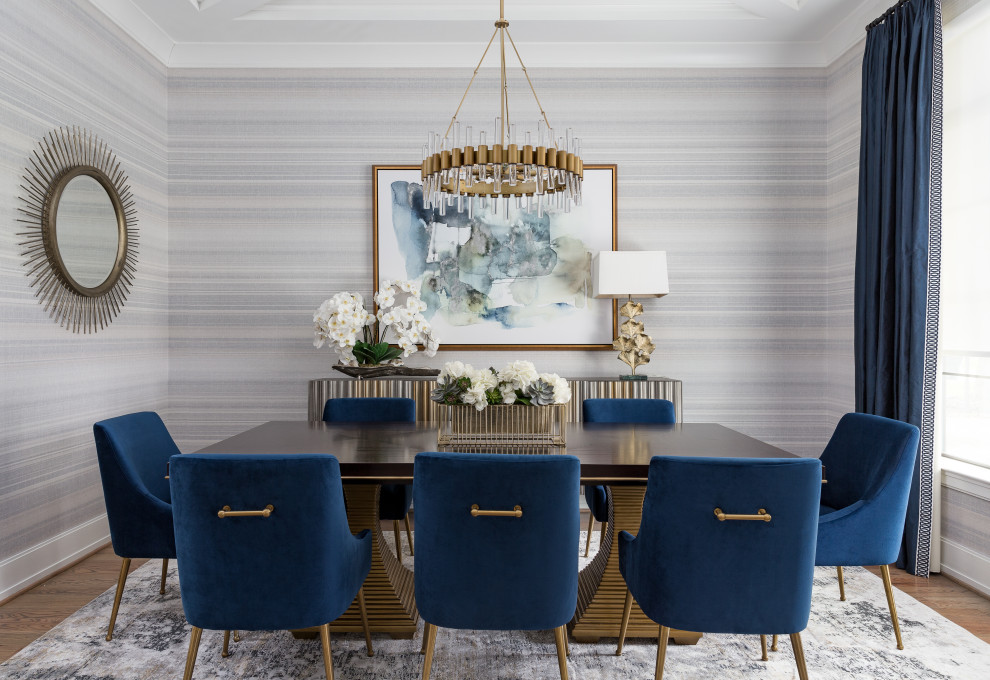 Inspiration for a transitional medium tone wood floor, brown floor, tray ceiling and wallpaper dining room remodel in Houston with multicolored walls