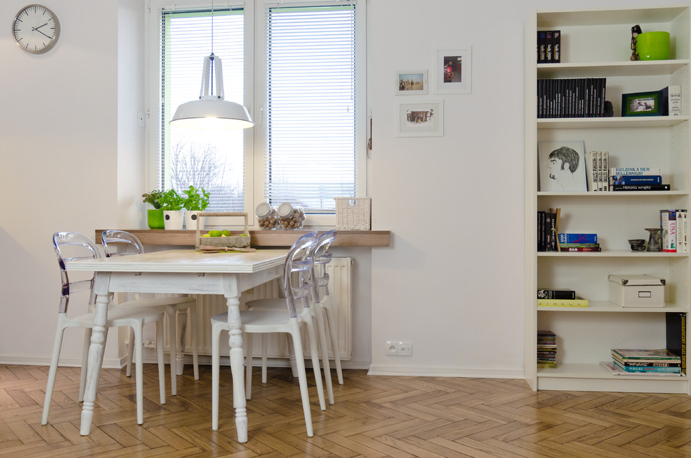 This is an example of a contemporary dining room in Other with white walls and dark hardwood flooring.