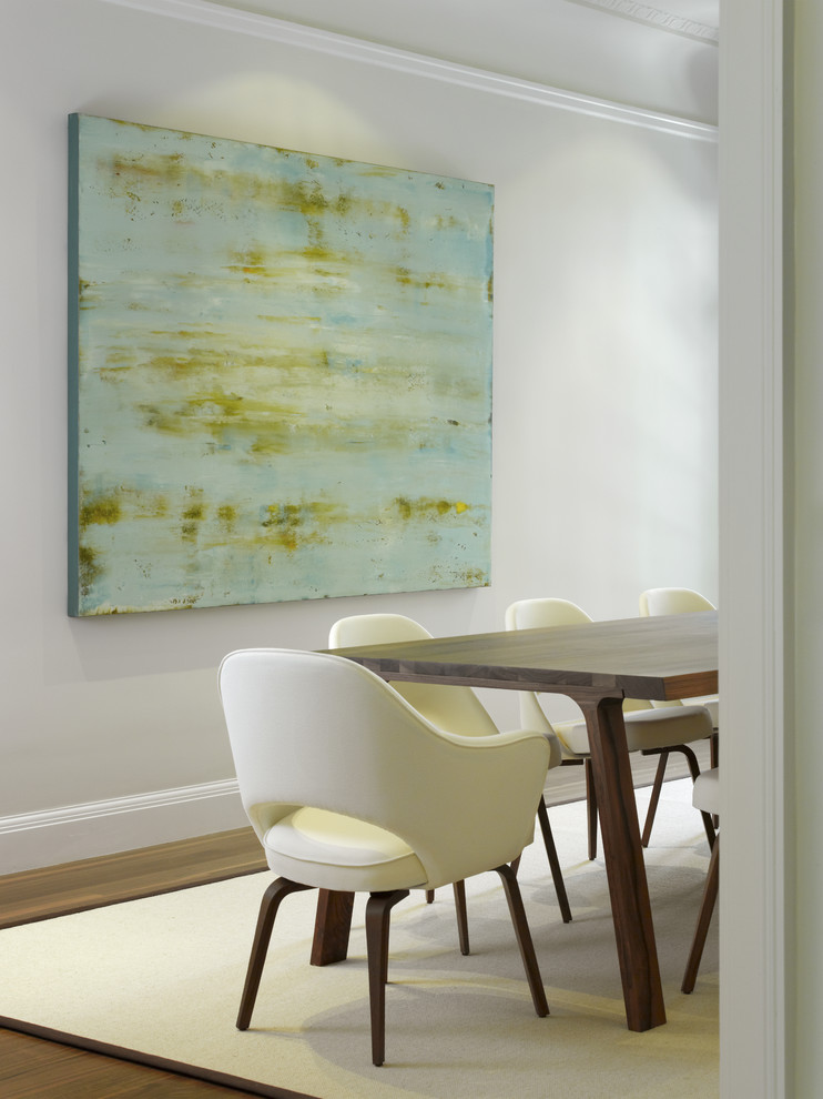 Inspiration for a contemporary medium tone wood floor dining room remodel in San Francisco with white walls