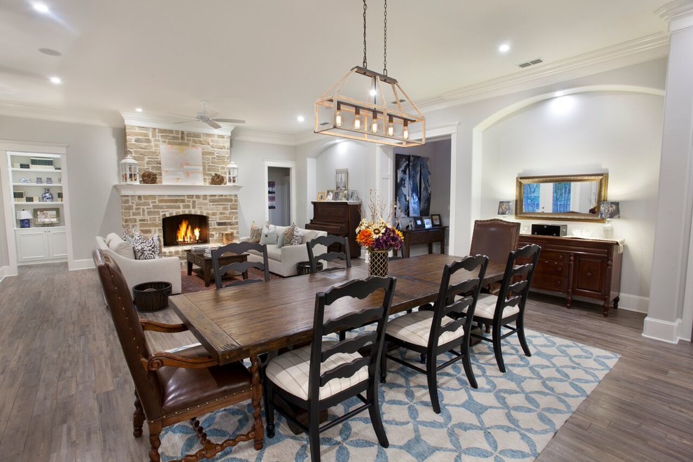 Photo of a medium sized classic open plan dining room in Austin with grey walls.