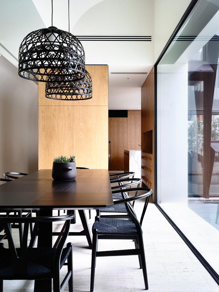 Example of a trendy dining room design in Melbourne
