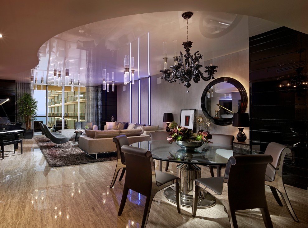 Design ideas for a contemporary open plan dining room in Miami with marble flooring.