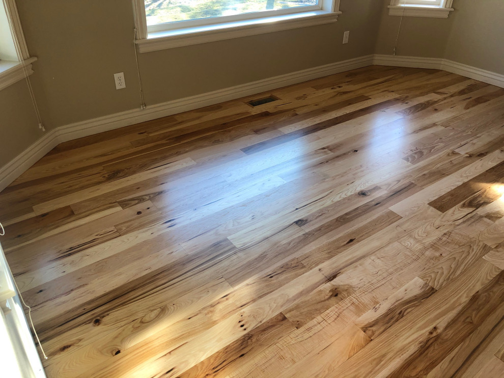 Stone fireplace wall and mantel Dining Room Boise by Phoenix