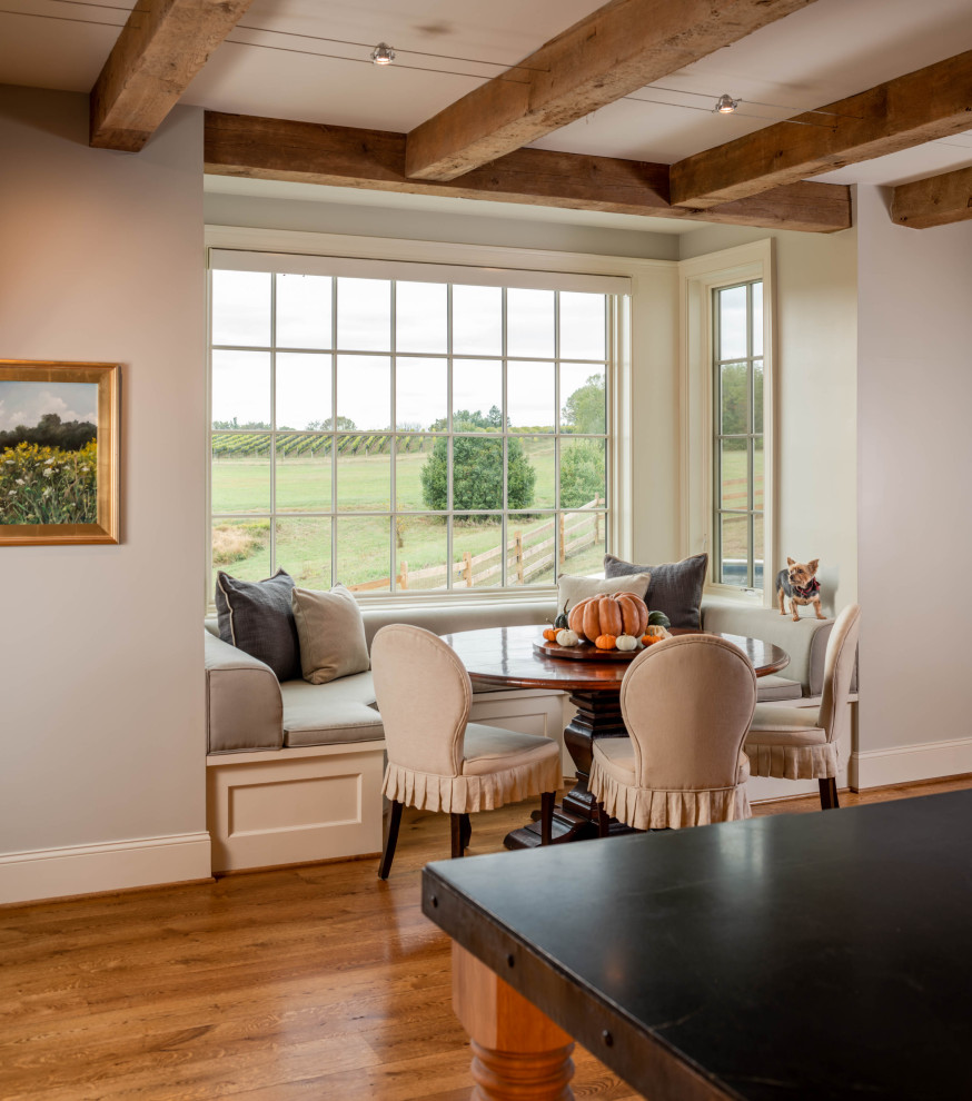 This is an example of a farmhouse dining room in Philadelphia.