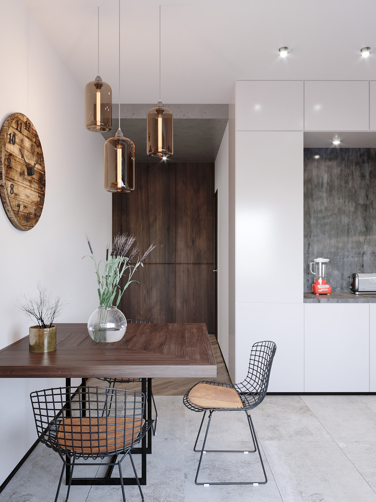 Стильный дизайн: маленькая кухня-столовая в стиле лофт с полом из керамической плитки, серым полом и белыми стенами без камина для на участке и в саду - последний тренд