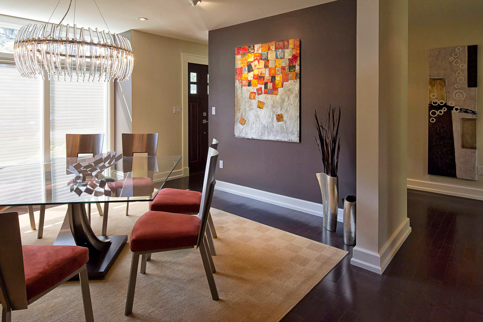 Contemporary open plan dining room in New York with purple walls and dark hardwood flooring.