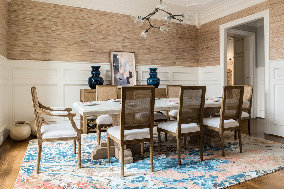 Enclosed dining room in Charlotte with metallic walls, medium hardwood flooring and brown floors.