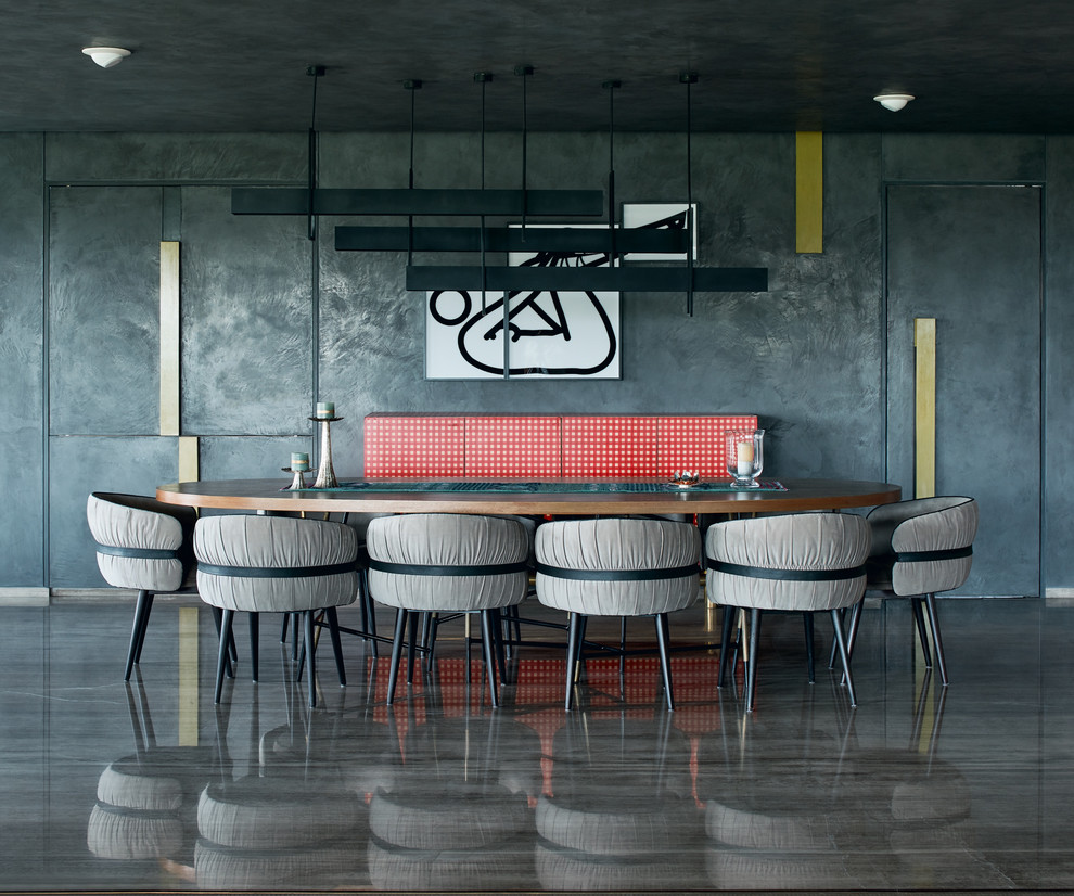 Ispirazione per una grande sala da pranzo industriale con pareti grigie e pavimento grigio