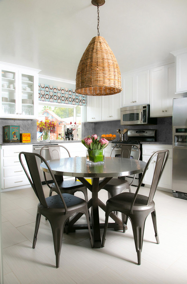 Example of a mid-sized transitional beige floor kitchen/dining room combo design in San Diego with white walls