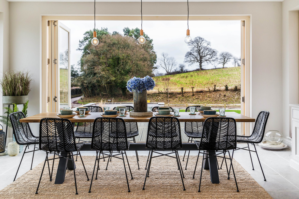 Design ideas for a farmhouse dining room in Surrey.