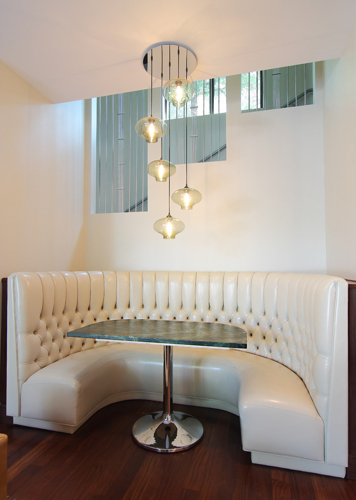 Dining room - contemporary dining room idea in Austin with white walls