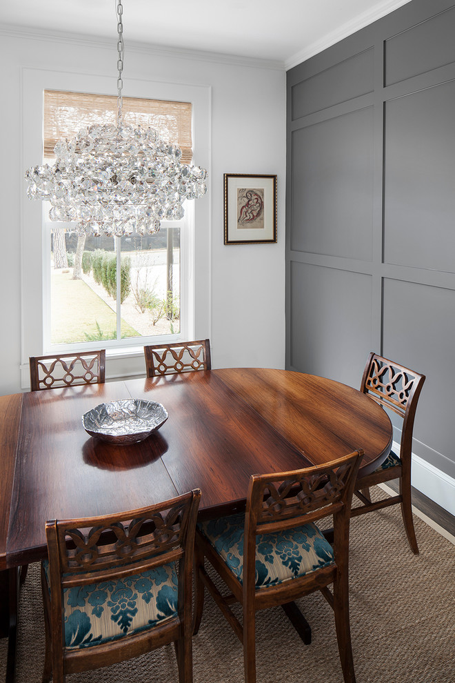 Large traditional enclosed dining room in Austin with grey walls, dark hardwood flooring and brown floors.