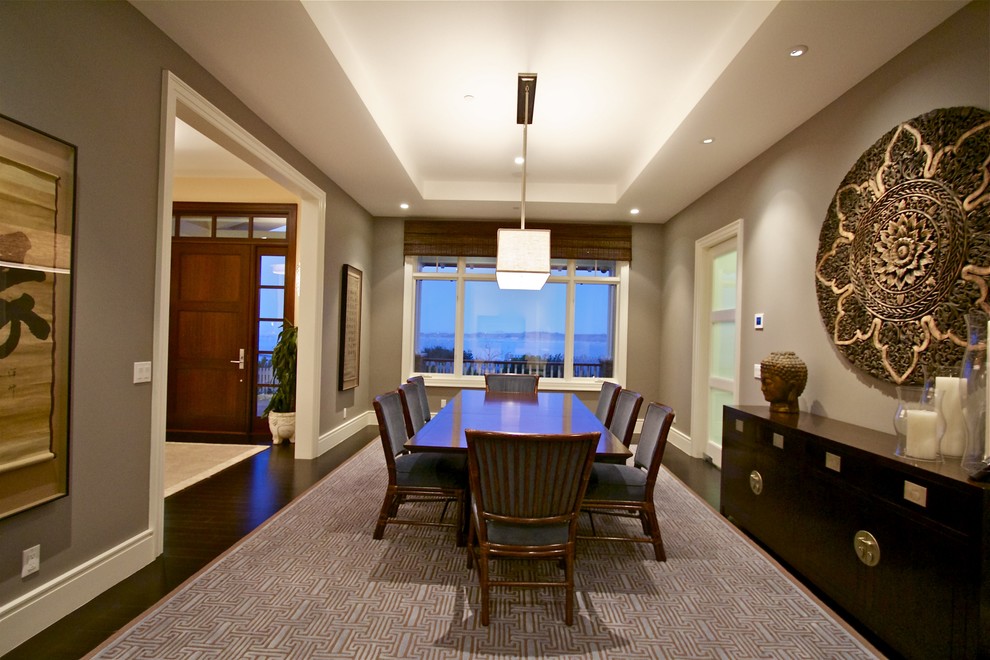 Large classic dining room in San Francisco with beige walls and dark hardwood flooring.