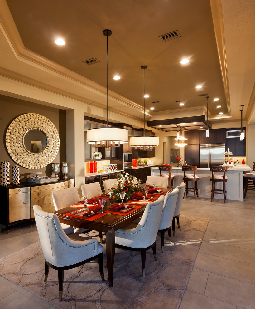 Inspiration for a large modern dining room remodel in Tampa with beige walls