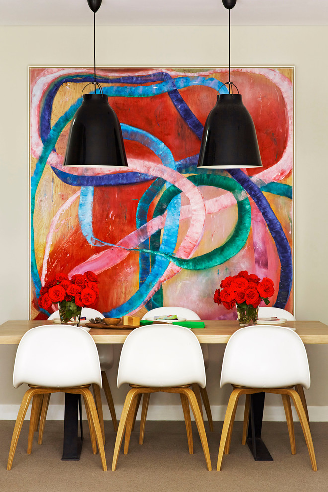 Example of a mid-sized trendy carpeted dining room design in Sydney with beige walls
