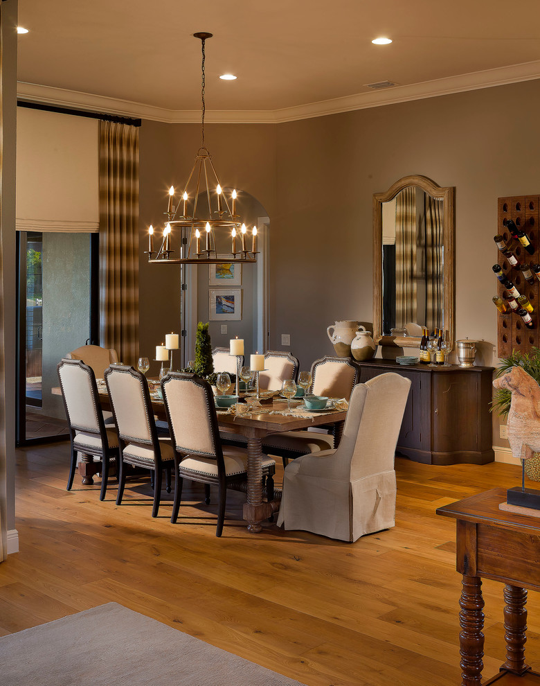 Design ideas for a large rural open plan dining room in Tampa with grey walls and medium hardwood flooring.