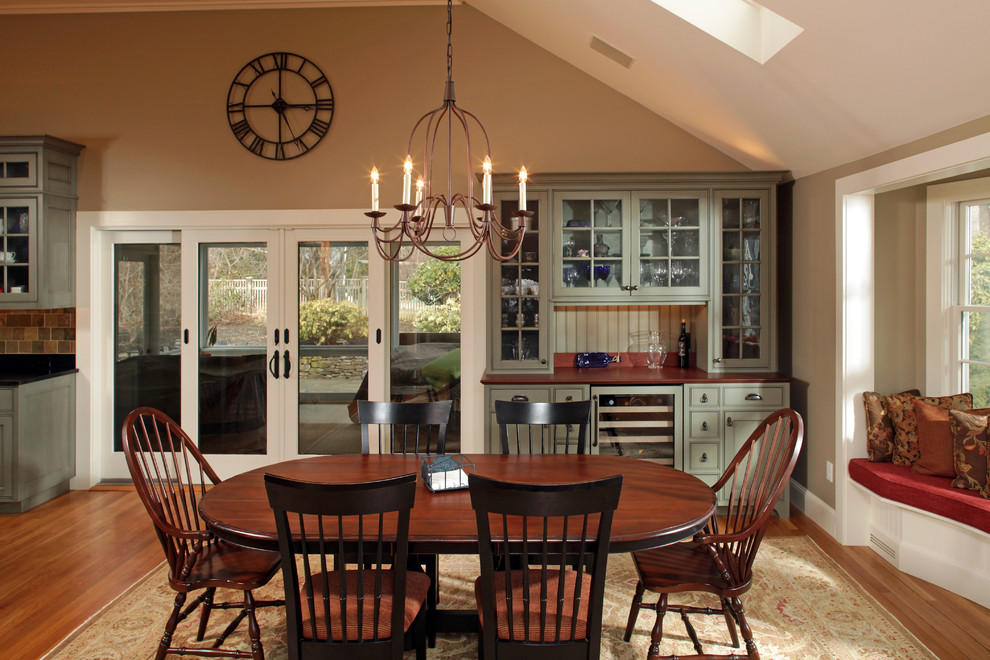 Inspiration for a timeless light wood floor kitchen/dining room combo remodel in Boston with beige walls