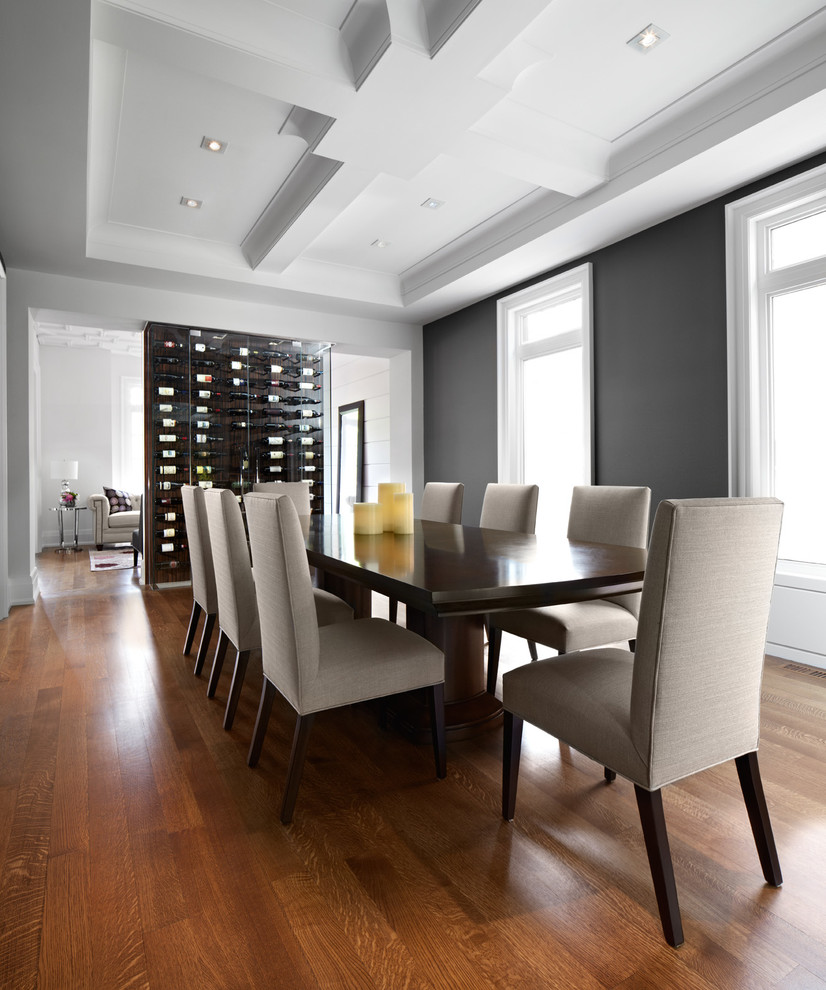 Dining room - contemporary dining room idea in Toronto with black walls