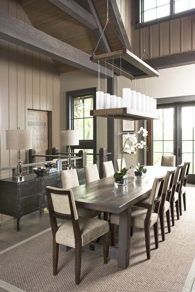 Photo of a large rustic open plan dining room in Other with white walls, light hardwood flooring and feature lighting.