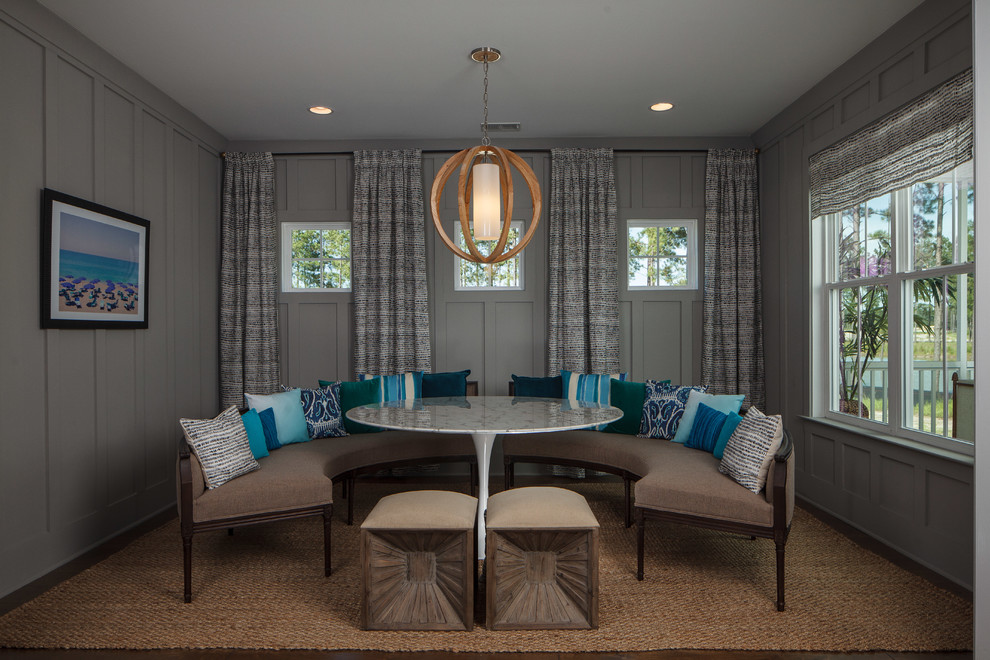 Photo of a medium sized traditional enclosed dining room in Charleston with grey walls.