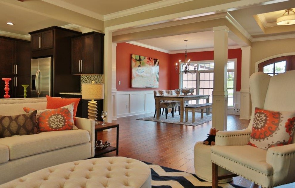 Inspiration for a medium sized traditional open plan dining room in Louisville with red walls.