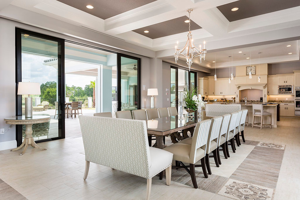 Expansive traditional kitchen/dining room in Orlando with grey walls, porcelain flooring and no fireplace.