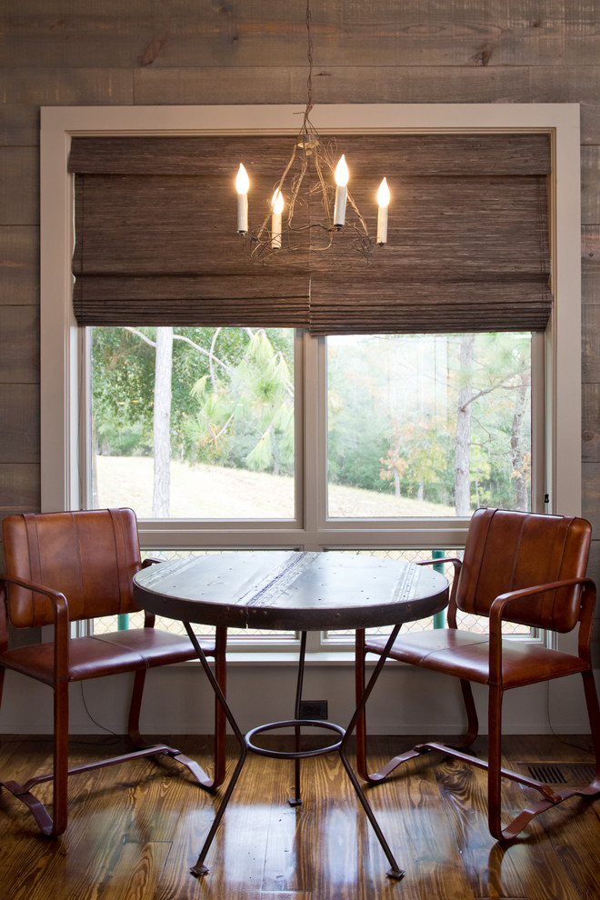 Cette image montre une salle à manger design avec un mur gris.