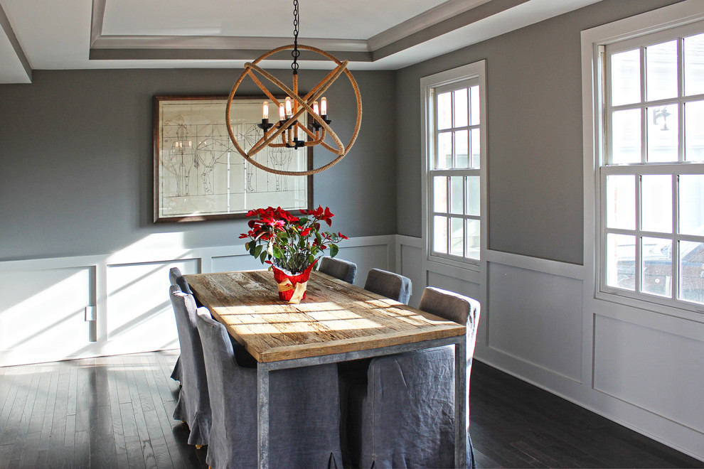 Design ideas for a large country enclosed dining room in Columbus with grey walls and dark hardwood flooring.