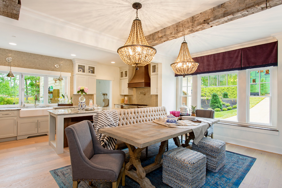 Inspiration for a transitional light wood floor kitchen/dining room combo remodel in Richmond with white walls