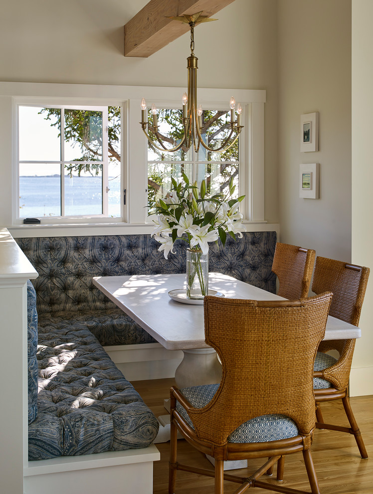 Photo of a scandinavian dining room in Portland Maine.