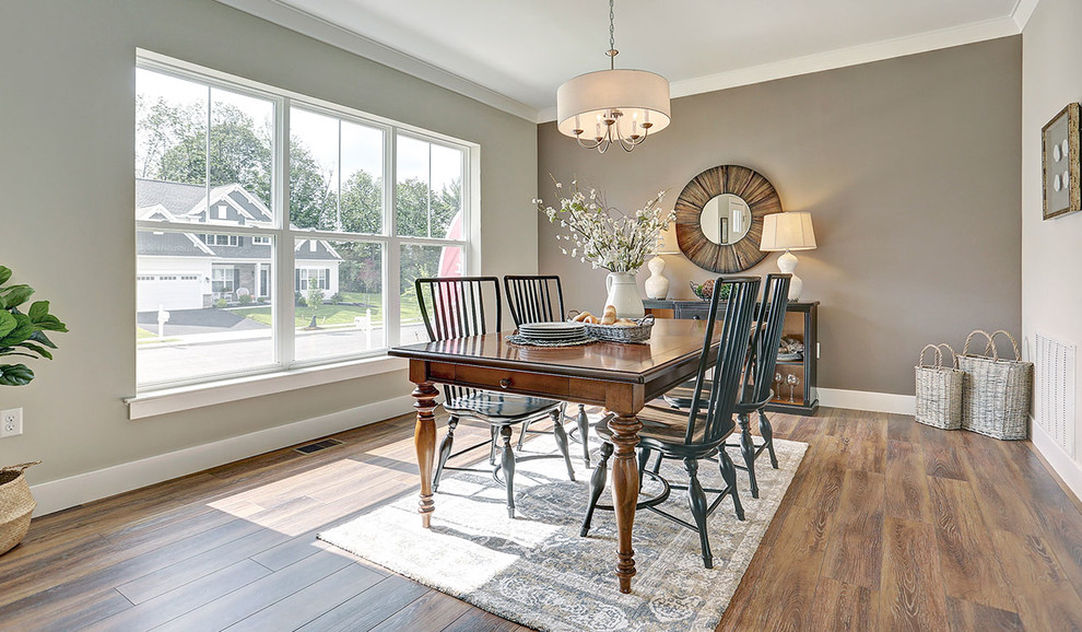 Inspiration for a large traditional open plan dining room in Other with grey walls and medium hardwood flooring.