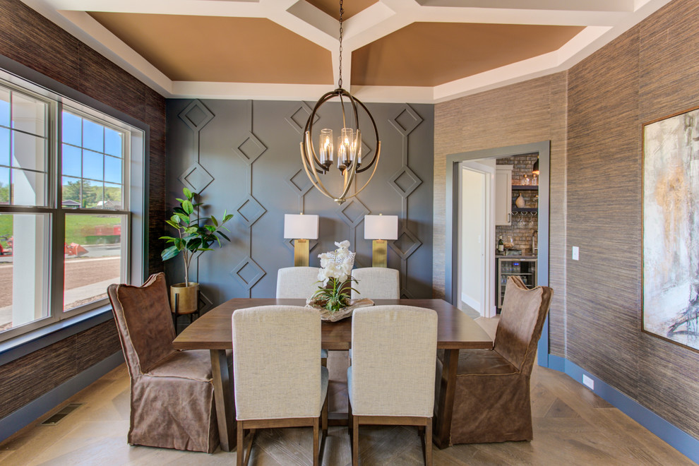 Large traditional enclosed dining room in Other with brown walls, medium hardwood flooring and feature lighting.