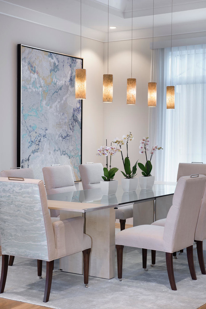 Inspiration for a medium sized contemporary open plan dining room in Miami with white walls, medium hardwood flooring and brown floors.