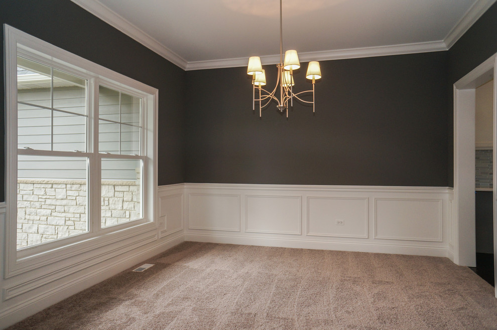 Inspiration for a large coastal carpeted enclosed dining room remodel in Chicago with gray walls